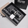 A black vacuum flask set with a black storage box and a beige cardboard insert.