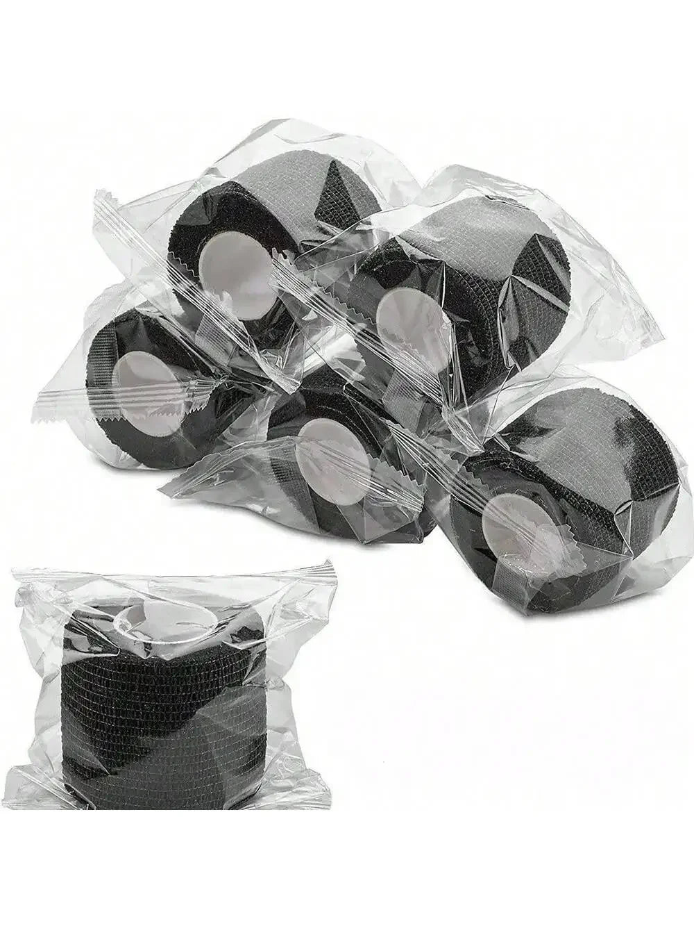 Plusieurs rouleaux de bandages élastiques réutilisables auto-adhésifs noirs emballés dans du plastique transparent.