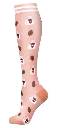 A close-up of a light pink compression sock with small heart patterns and white stripes.
