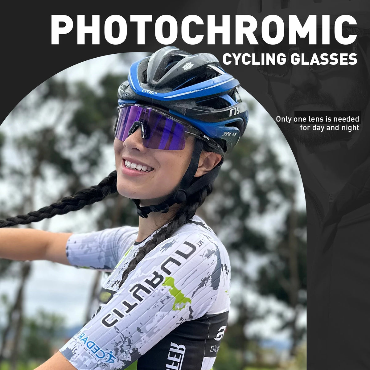 A smiling female cyclist wearing photochromic cycling glasses on her helmet outdoors.