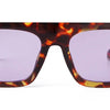 Vintage oversized square sunglasses with a tortoiseshell pattern frame and purple lenses.