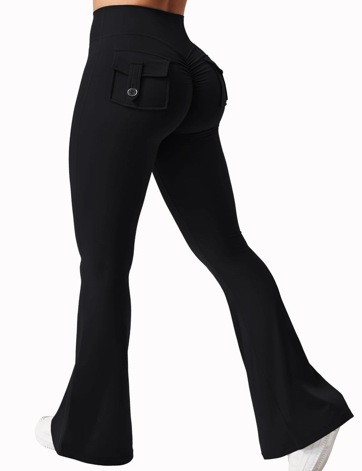 Black high stretch women's yoga leggings shown from the side view