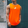A muscular man wearing a bright orange sleeveless sports tank top with a white logo, standing outdoors.