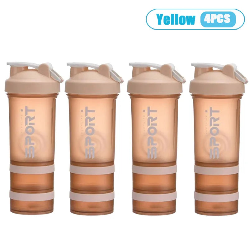 Four yellow 3-layer protein shaker bottles with handles shown side by side.