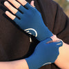 A close-up of a hand wearing a blue cycling glove with a white logo, shown against a dark brown sleeve.