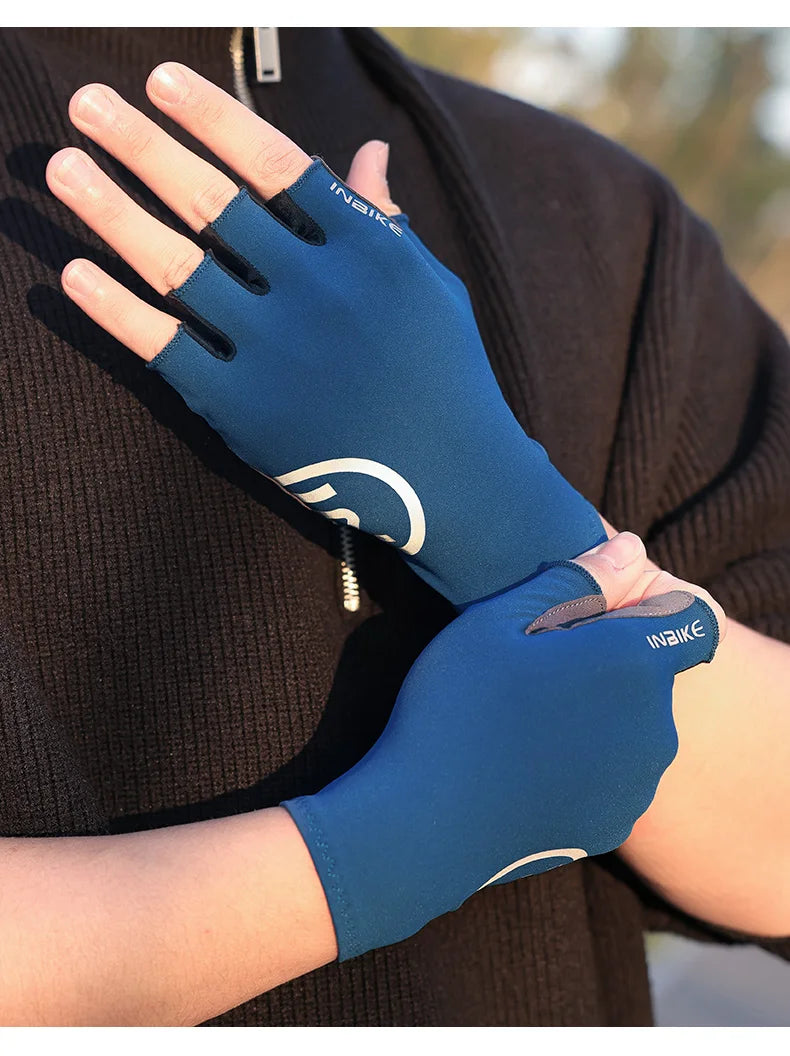A close-up of a hand wearing a blue cycling glove with a white logo, shown against a dark brown sleeve.