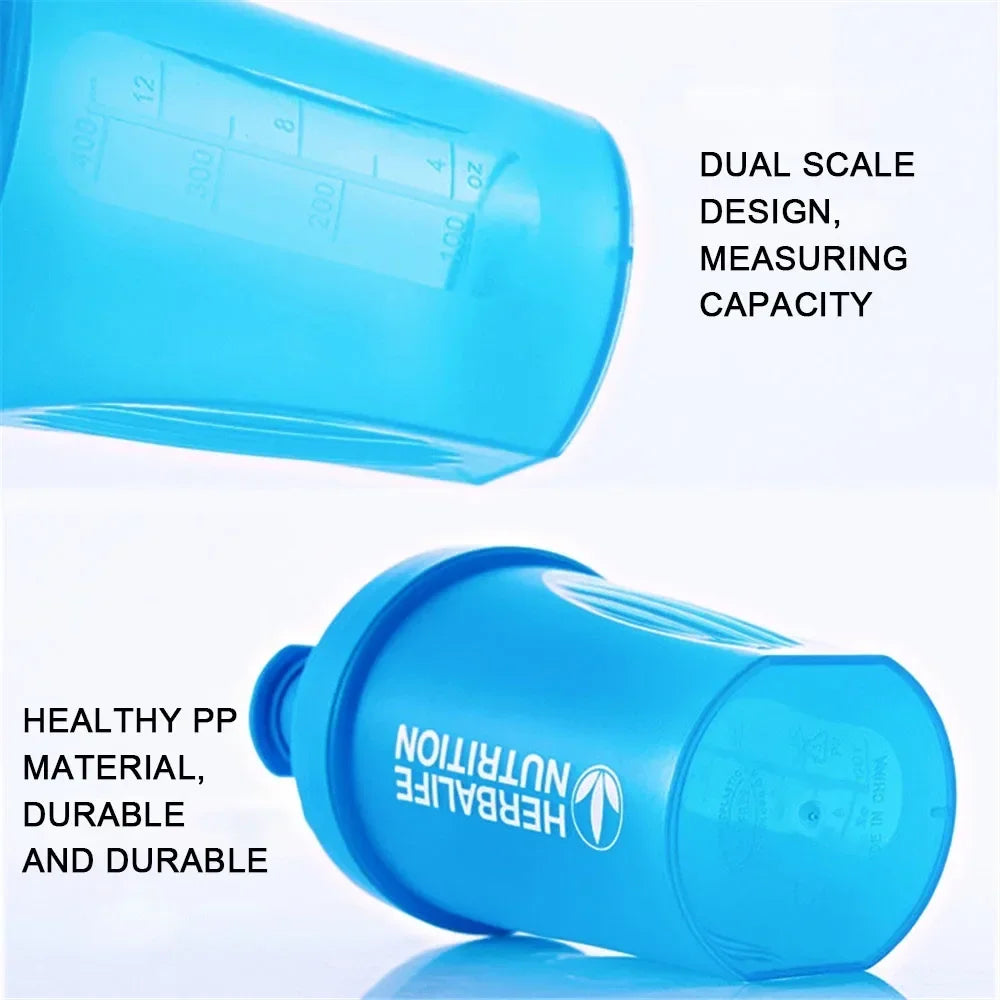 A bright blue leakproof protein shaker bottle with a dual scale design and healthy pp material.