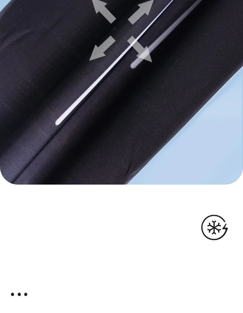 Close-up of black dynamic breathable arm sleeves showing the fabric texture and directional arrows for stretching.