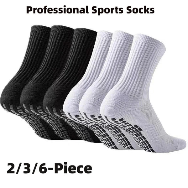 A set of professional sports socks in black and white featuring silicone grip for football.