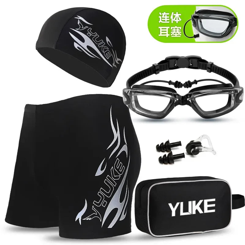 Black men's swim gear set including a cap, goggles, and earplugs