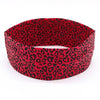 A red and black leopard print women's sports headband.