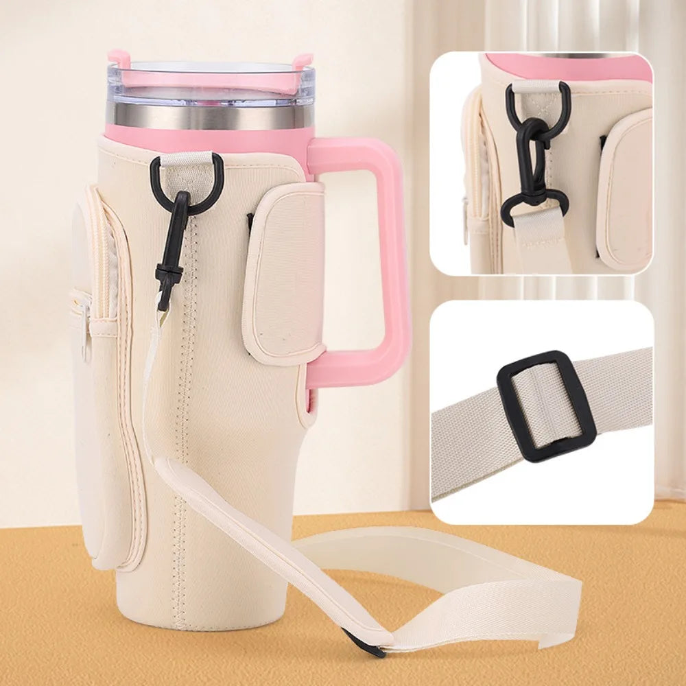 A beige adjustable water bottle carrier pouch with a pink handle and strap is shown next to a white water bottle.