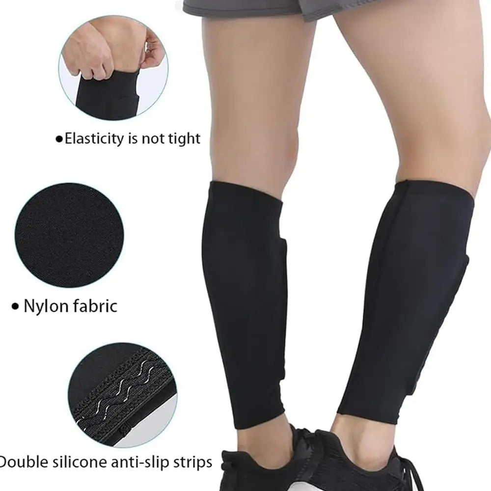 Black nylon fabric leg guards with double silicone anti-slip strips shown on a person's leg.
