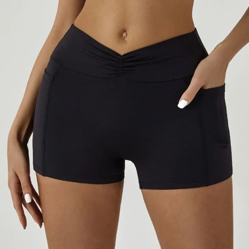 A model wearing black high-waisted yoga and fitness leggings, shown from the front.