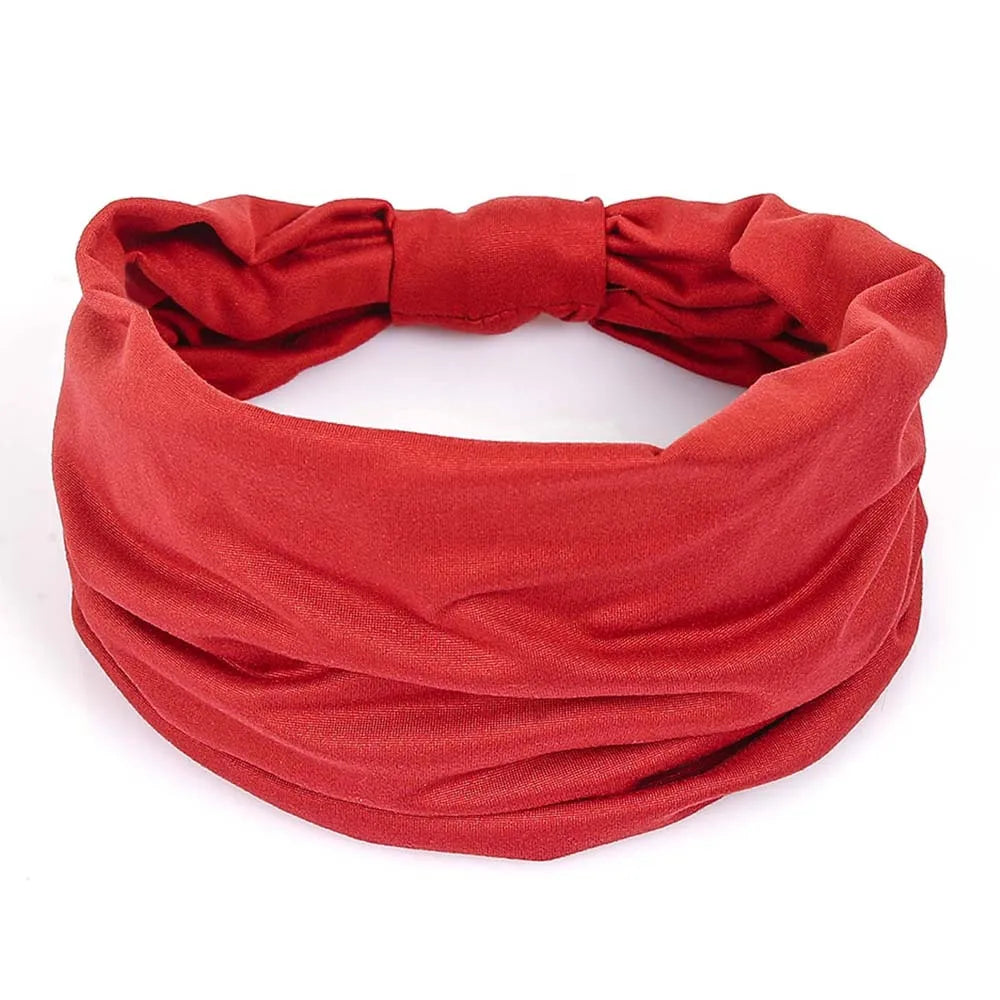 A vibrant red non-slip elastic headband designed for fitness and hair