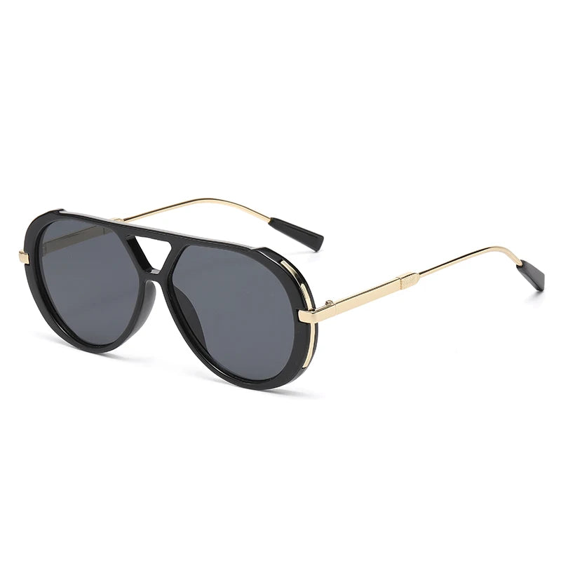 Vintage oversized designer black sunglasses with gold accents