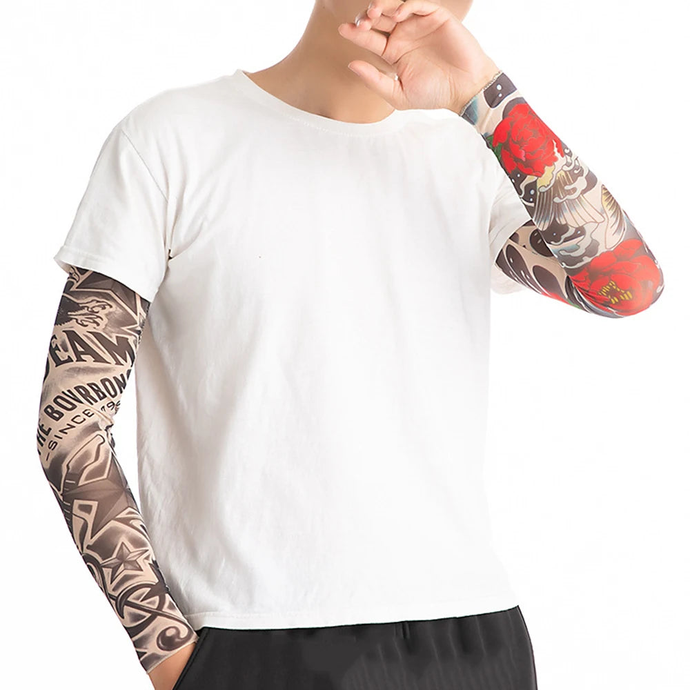 A person wearing a white t-shirt and patterned arm sleeves is shown.