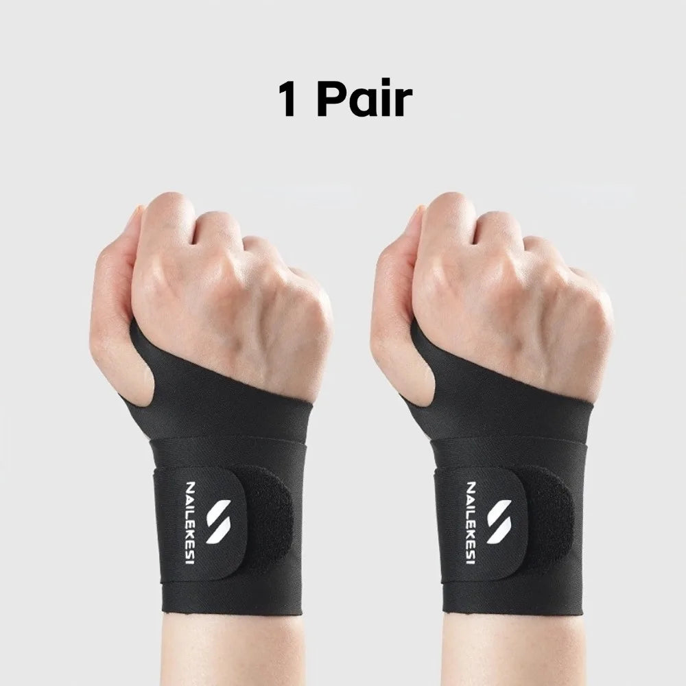 A pair of black nailekesi wrist compression braces shown on hands.