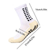 White performance sports grip socks shown from the side with measurements.