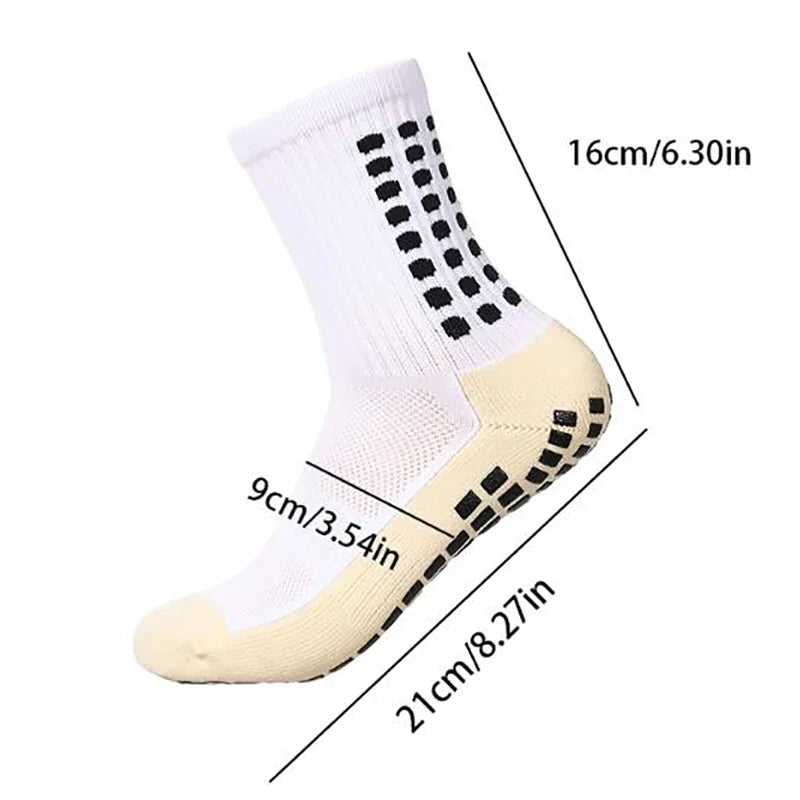 White performance sports grip socks shown from the side with measurements.