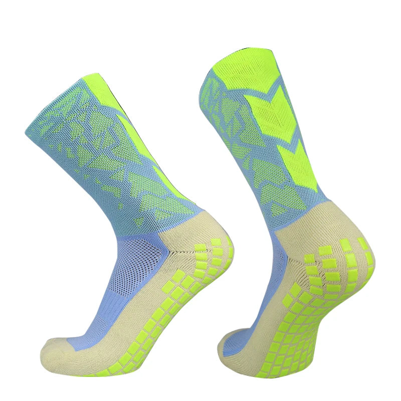 A pair of neon yellow and light blue anti-slip training socks shown from the side.