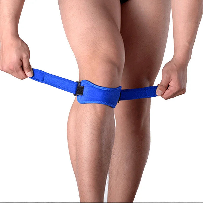 A person is wearing a blue adjustable patella tendon support brace on their knee.