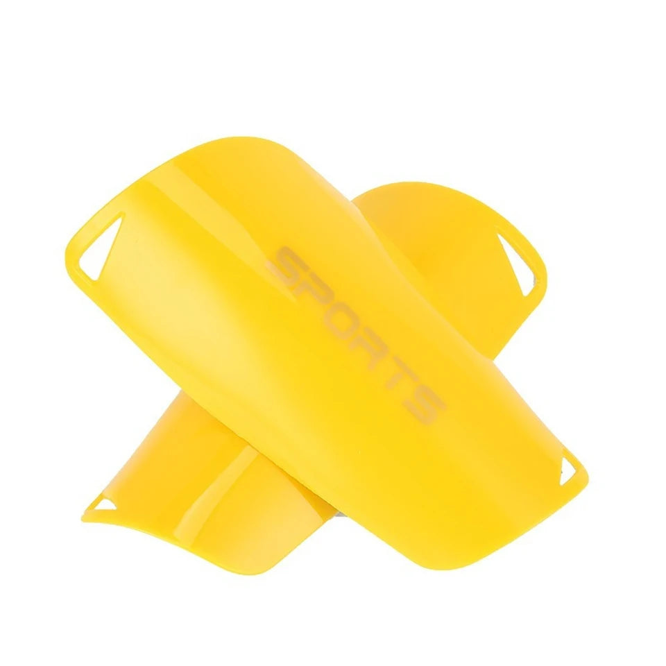 A bright yellow pair of durable soccer shin guards shown from the side.
