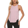 A woman wearing a light pink quick-dry yoga and gym tank top and black leggings.