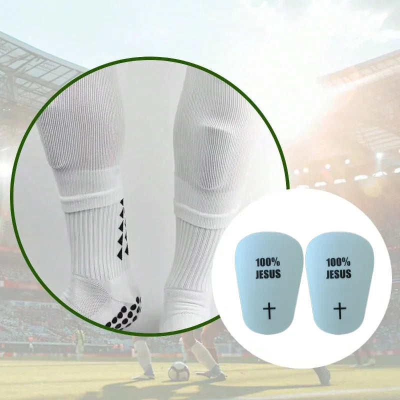 Close-up of white lightweight soccer shin guards worn by a player during a game.