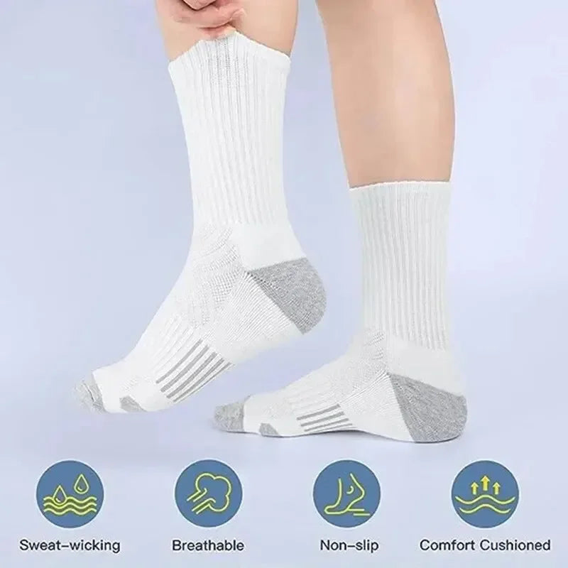 White and gray athletic socks shown on a leg, highlighting features like sweat-wicking, breathable, non-slip, and cushioned c