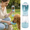 A woman feeds a dog using a portable pet water and food dispenser in light blue.