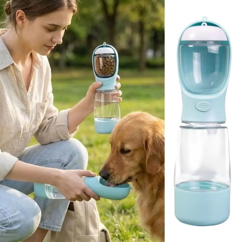 A woman feeds a dog using a portable pet water and food dispenser in light blue.