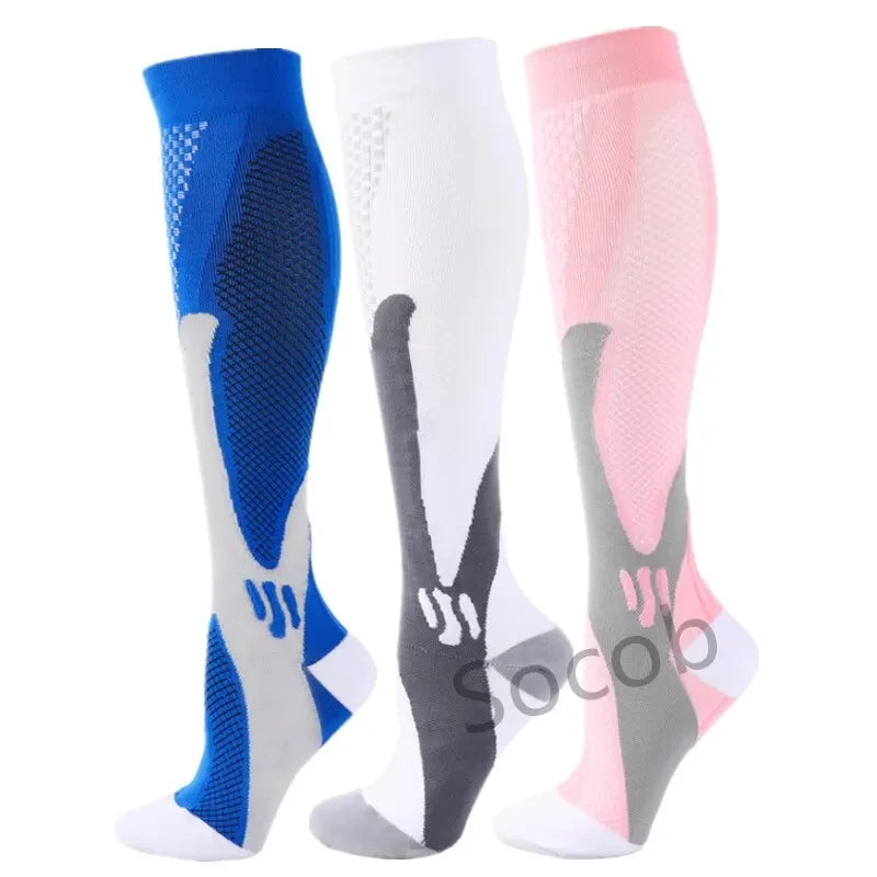 Three pairs of compression socks in blue, white, and pink for athletes and medical use