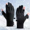 A pair of black performance outdoor sports gloves shown against a snowy background.