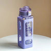 A purple leakproof sport water bottle with a screw-on cap sits on a white surface.