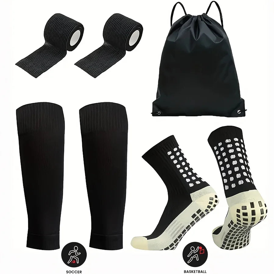 A set of black football gear including a sleeve, compression socks, and basketball socks.