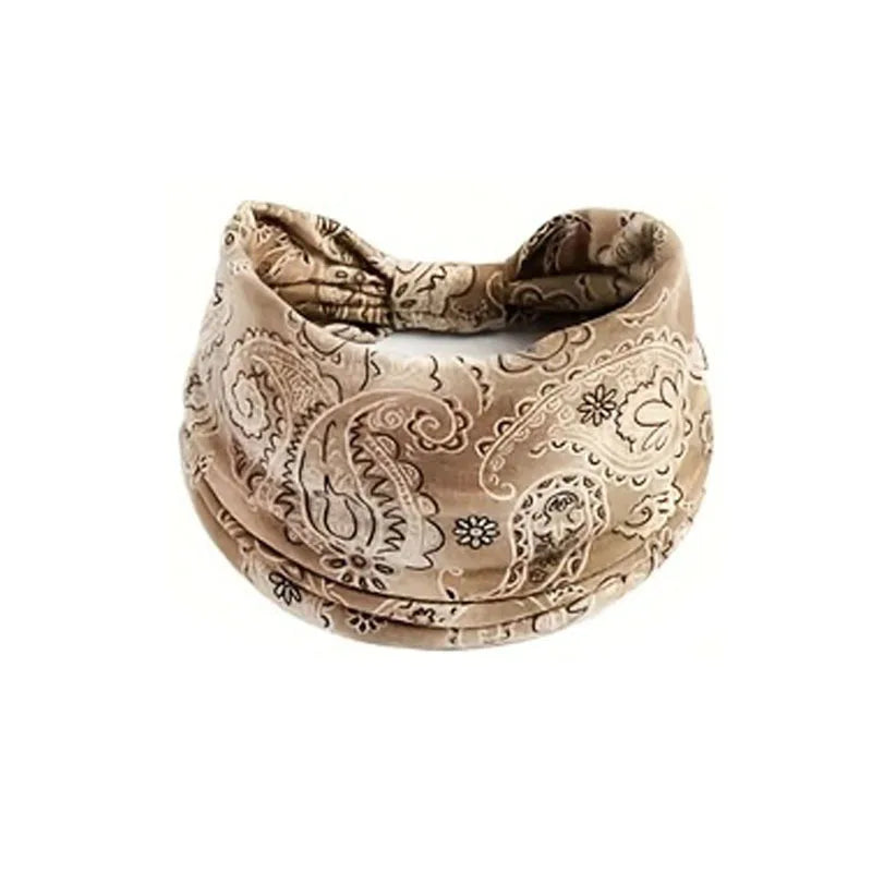 Beige Boho-Stretch-Haarband mit filigranen Paisley- und Blumenmustern.
