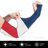 A hand is stretching a navy blue and white UV protection arm sleeve for sports and outdoor activities.