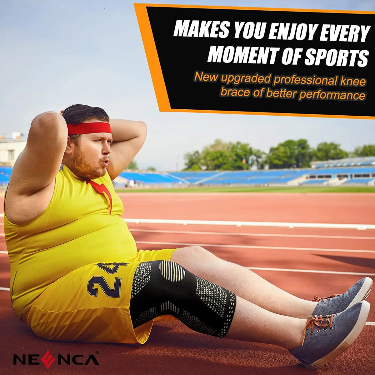 A man wearing a yellow athletic shirt and shorts is sitting on a running track, demonstrating the use of a knee brace.