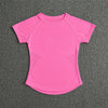 A bright pink seamless high-waist yoga top for women displayed against a dark gray textured background.