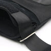 Black half finger tactical gloves shown with a strap detail.