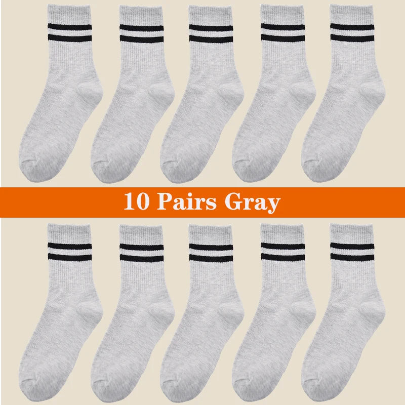 Ten pairs of gray breathable cotton sport socks displayed in a row.