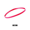 A pink elastic silicone sports headband shown in a loop.