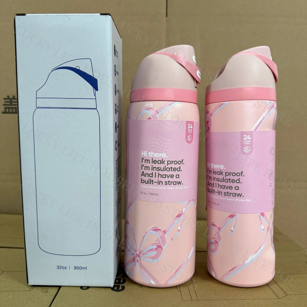 Two pink insulated sports water bottles with a straw are shown next to their packaging box.