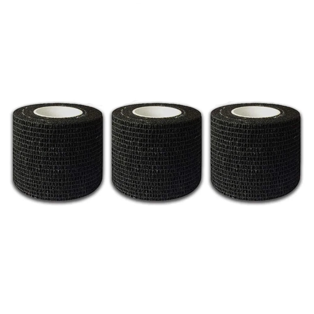 Three rolls of black self-adhesive tattoo grip tape stacked side by side.