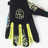 Gants de motocross noirs avec paumes jaune fluo et un logo géométrique à l'arrière