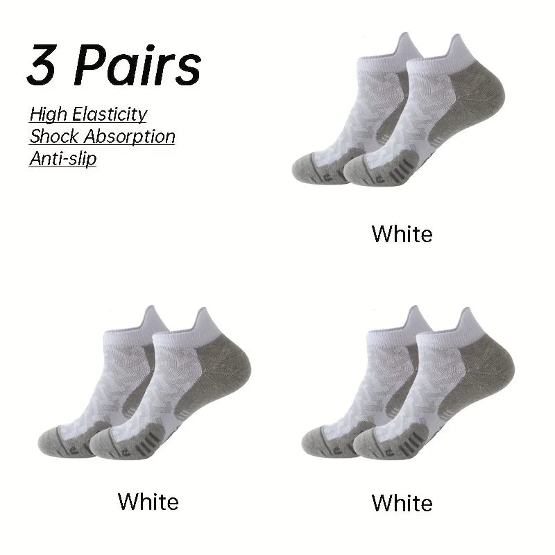 Three pairs of gray and white performance ankle socks shown from the top view.