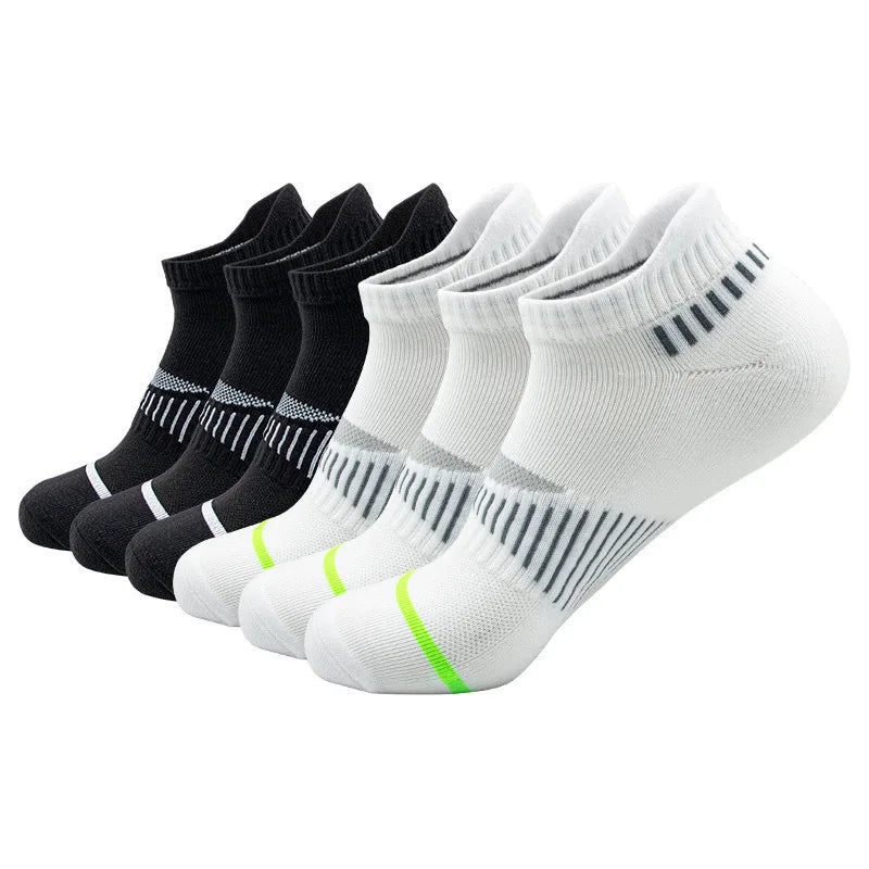 A set of classic crew socks for men in black, white, and gray stripes displayed flat.