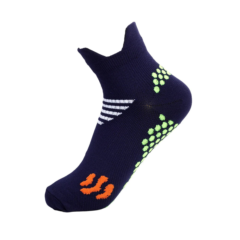 Navy blue massage and compression running socks with neon green accents