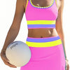 A model wears a color-block zigzag three-piece swimsuit set featuring pink, yellow, and purple stripes.